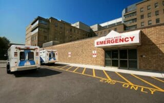 Ambulance outside an ER as hospitals prepare for a fire emergency