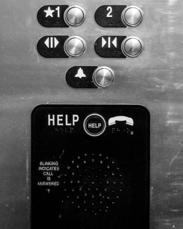 Elevator Emergency Phone – Perform Inspections with Software Best Practices - SCBA inspections - man wearing protective gear