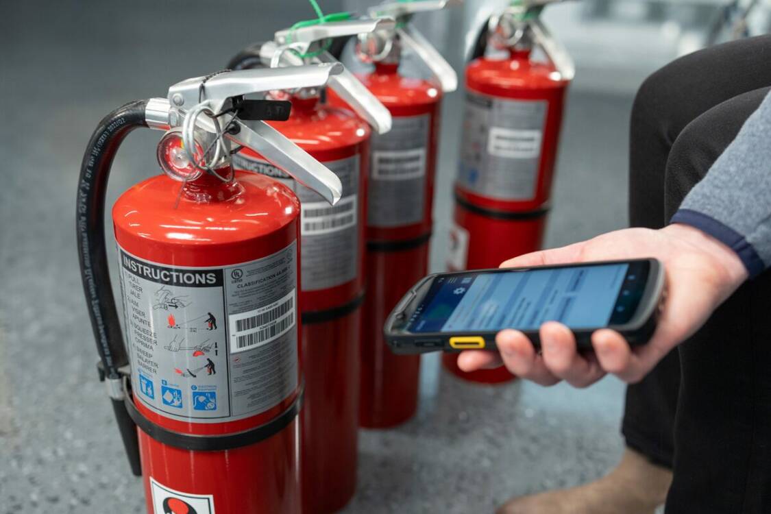 InspectNTrack Software being used to scan fire extinguishers in bulk (1) InspectNTrack software scanning fire extinguishers in bulk